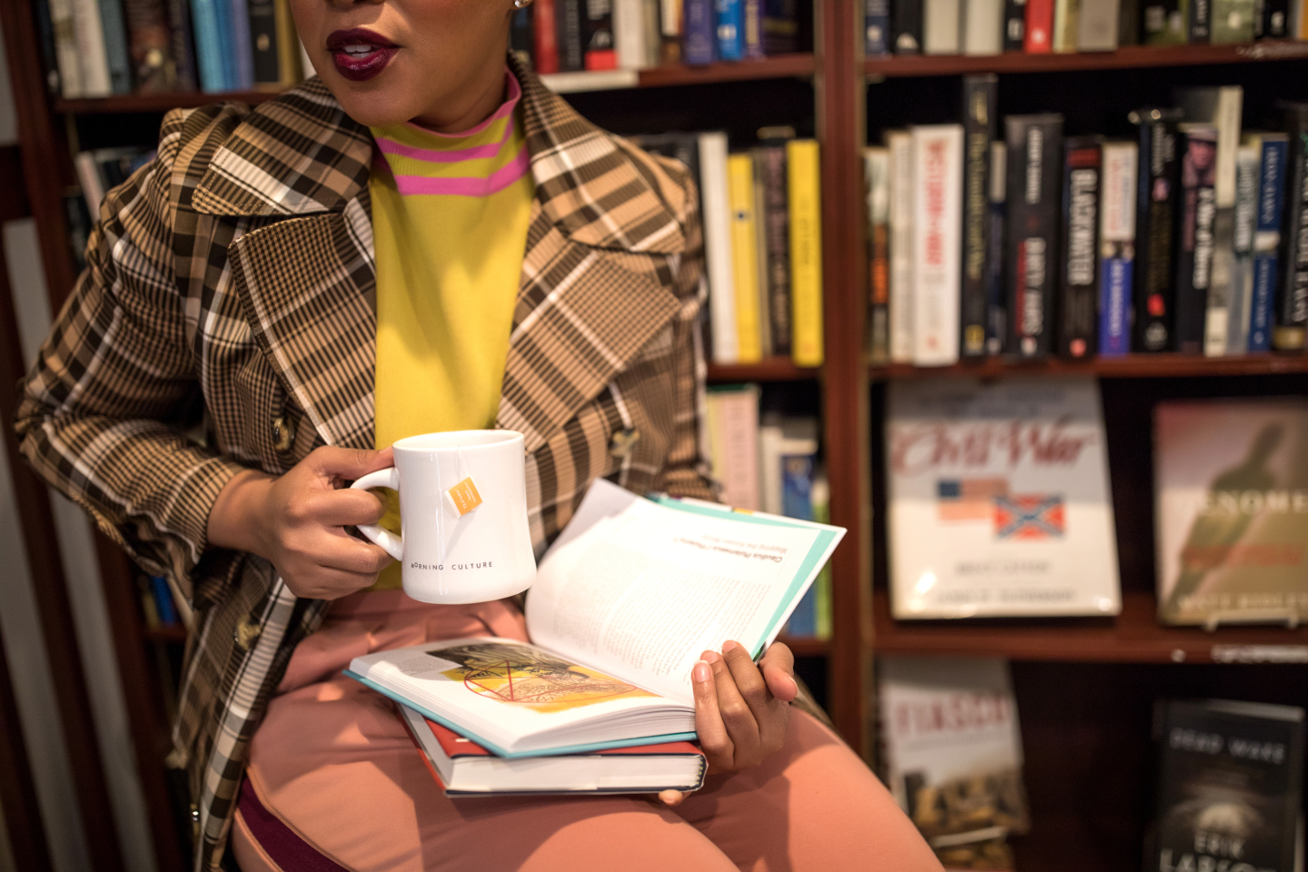 Library Plaid Coat ASOS Sweater and Pink Puma Pants Reading List