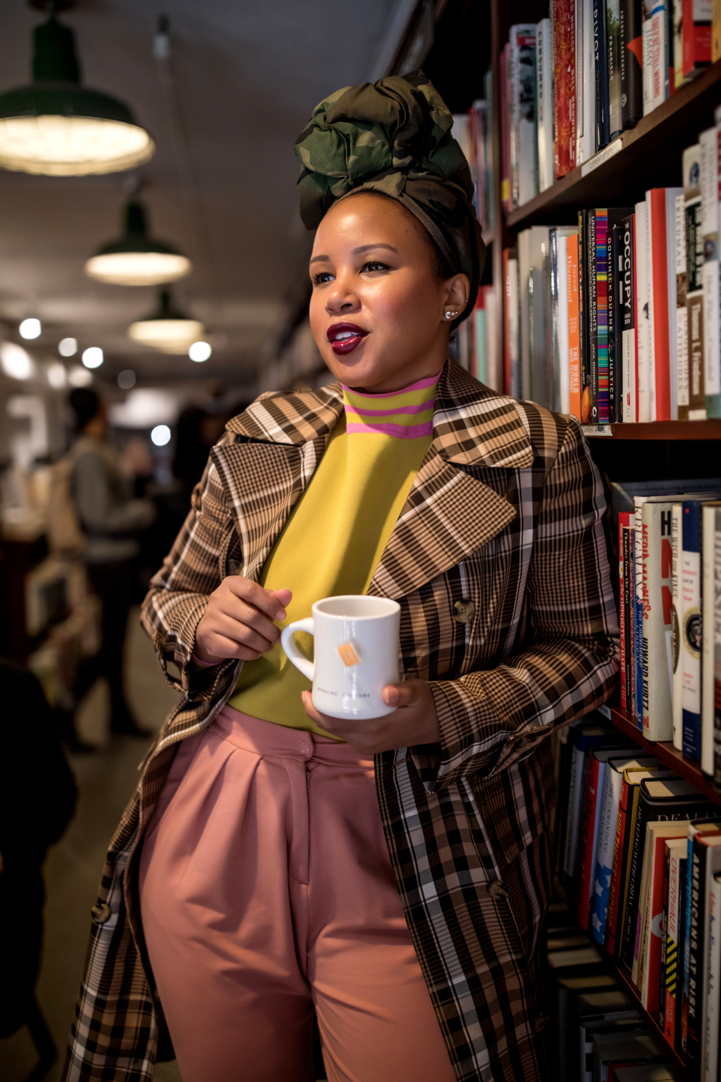 Library Plaid Coat ASOS Sweater and Pink Puma Pants Reading List