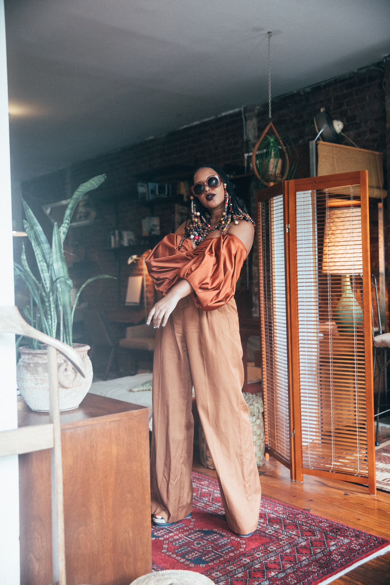 Fe Noel Rust Puff Sleeve Bodysuit and Sezane Rust Wide Leg Trousers 