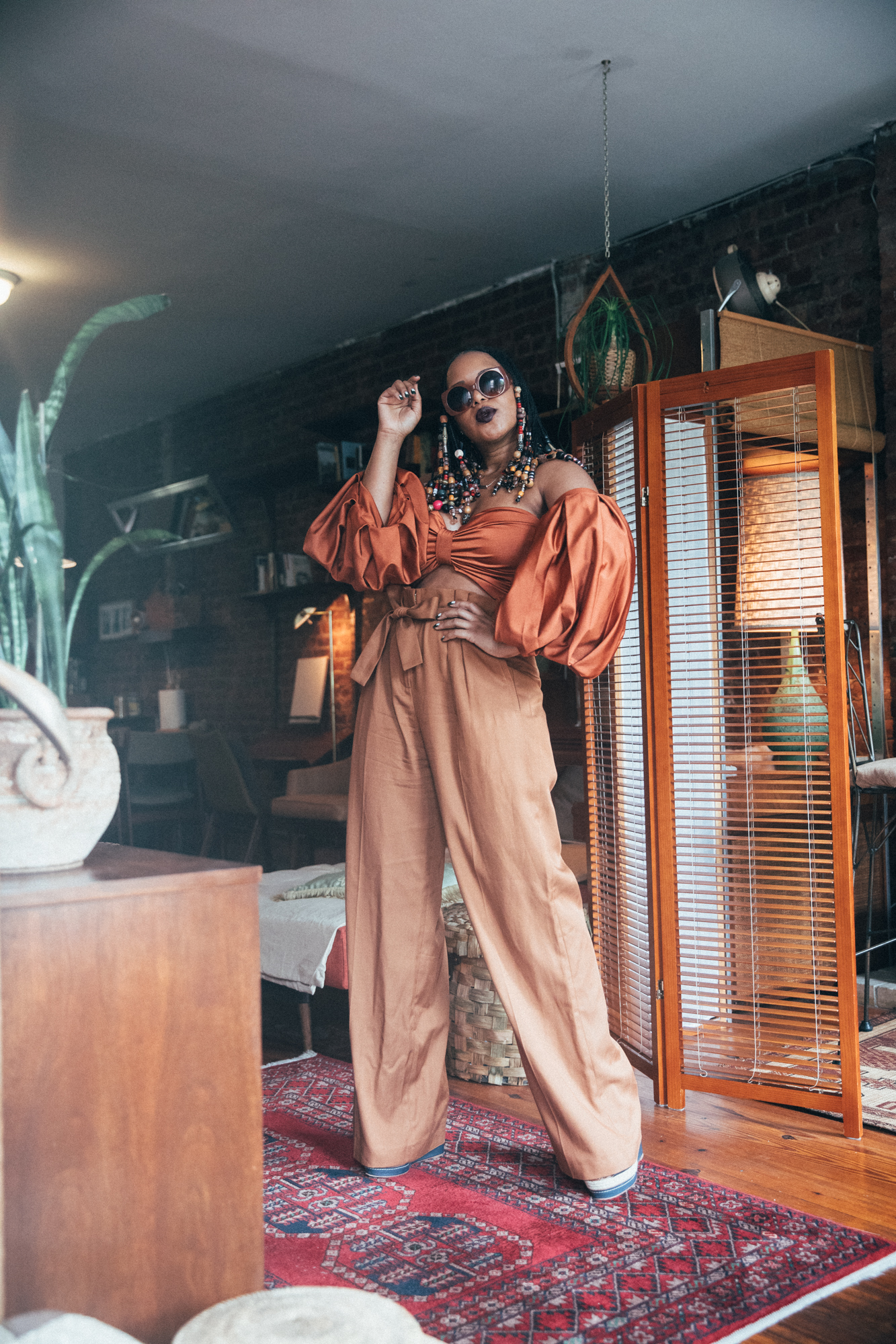 Fe Noel Rust Puff Sleeve Bodysuit and Sezane Rust Wide Leg Trousers 