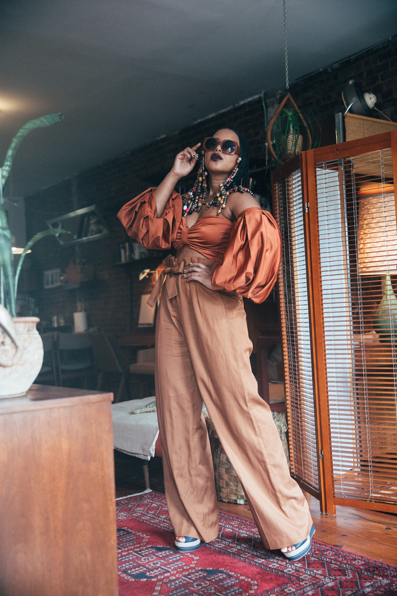 Fe Noel Rust Puff Sleeve Bodysuit and Sezane Rust Wide Leg Trousers 